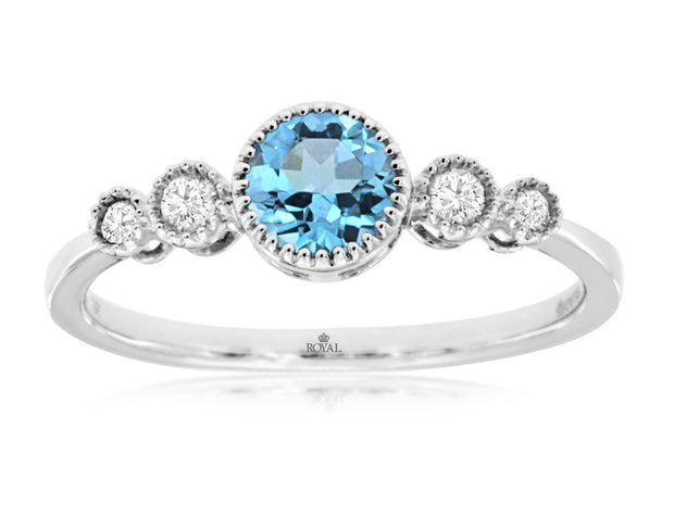 Blue Topaz and Diamond Ring in 14 kt White Gold