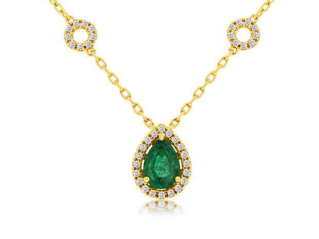 Emerald and Diamond Halo Necklace in 14 kt yellow gold
