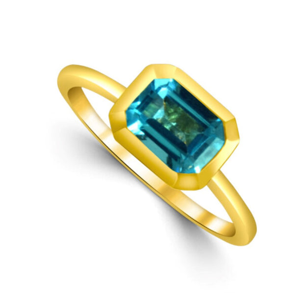 Emerald Cut Blue Topaz Ring in 14 kt Yellow Gold