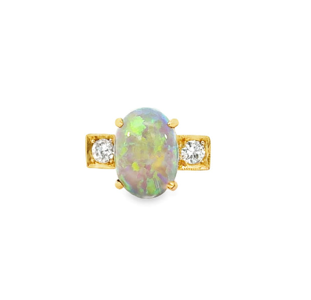 Australian Black Opal and diamond Ring in 14 kt Yellow Gold