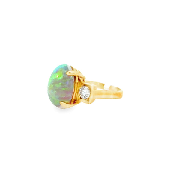 Australian Black Opal and diamond Ring in 14 kt Yellow Gold